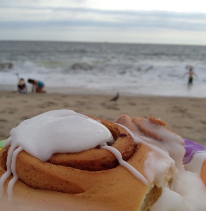 Cinnamon roll and coffee on the beach!