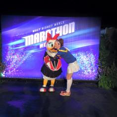 Giving Daisy Duck a hug before the Donald Duck Half-Marathon